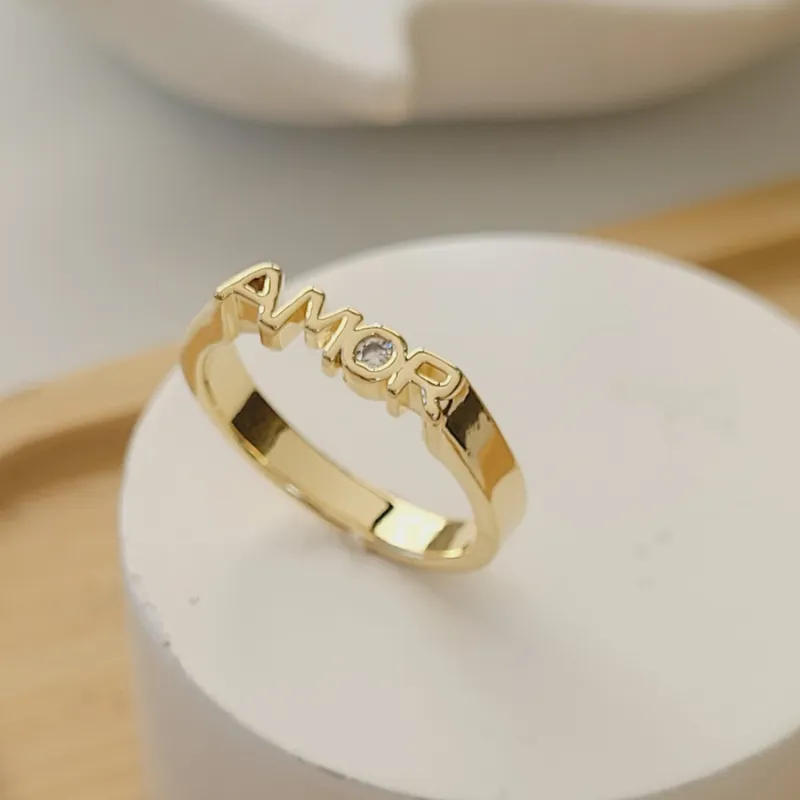Anel Amor, folheado a ouro 18k, foto da loja UseLírios